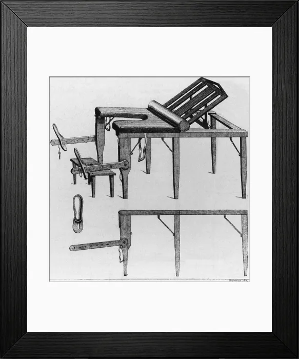 Framed Print : A wooden birthing table with adjustable back and leg supports, an opening in the seat, and a foot stool Framed Print : A wooden birthing table with adjustable back and leg supports, an opening in the seat, and a foot stool