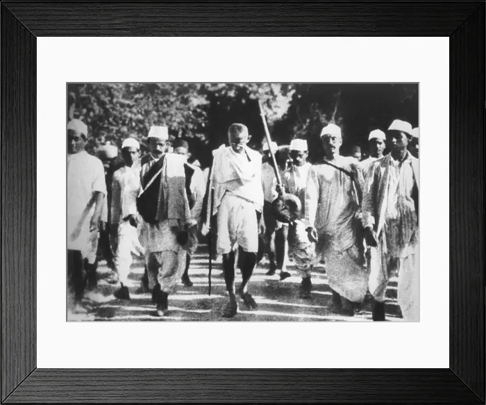 Framed Print : Mohandas Gandhi on the Salt March in 1930. He walked from 240 miles to the sea coast to produce salt without paying the British colonial tax. (BSLOC_2013_9_95) Framed Print : Mohandas Gandhi on the Salt March in 1930. He walked from 240 miles to the sea coast to produce salt without paying the British colonial tax. (BSLOC_2013_9_95)