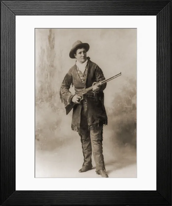 Framed Print : Calamity Jane (1852-1903), in a studio portrait. She gained fame in the 1870s and later toured in Wild West shows. Ca. 1885