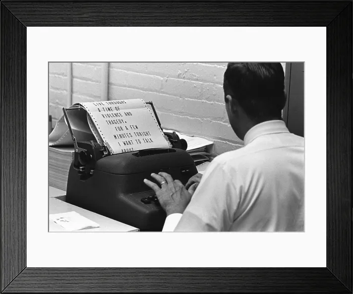 Framed Print : A White House staffer types President Lyndon Johnson's address for a 1960s teleprompter. The text is from a televised address concerning civil unrest in American cities