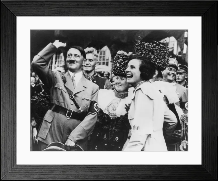 Framed Print : Adolf Hitler with film maker Leni Riefenstahl on Nazi party day in Nuremberg, 1934. Riefenstahl made her film, Triumph of the Will at the 1934 Nazi Party rally
