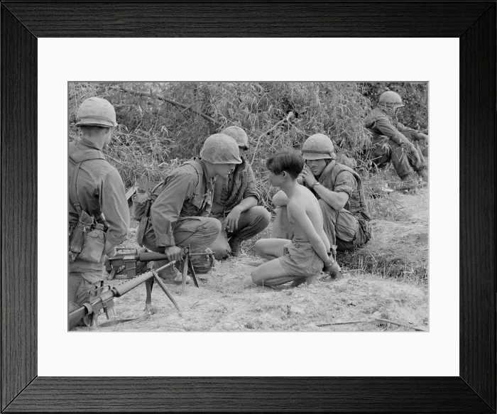 Framed Print : Viet Cong prisoner of war. US Marines interrogate a prison during a search and destroy mission code named Operation Badger Catch in Quang Tri Province. Jan 23-26, 1968