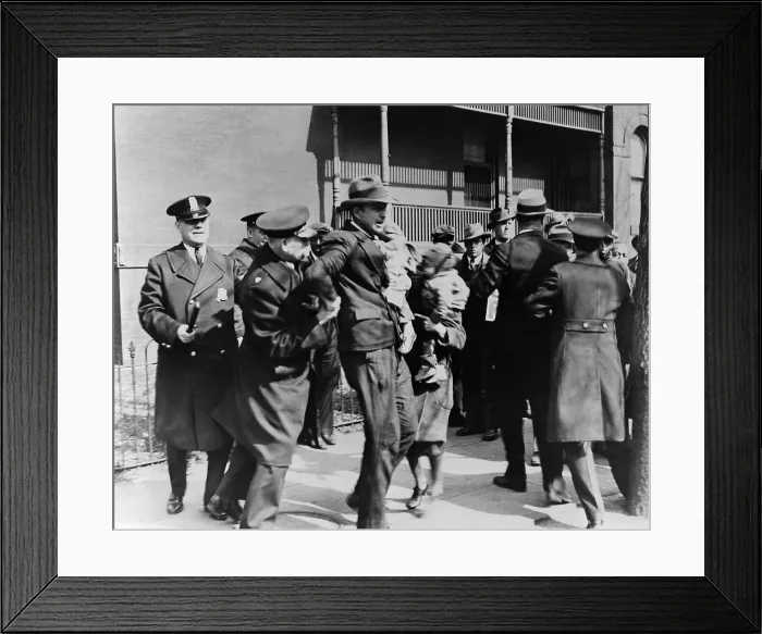 Framed Print : Washington D.C. Police arrest a man carrying child as others look on during a Depression era protest of unemployed. 1933 Framed Print : Washington D.C. Police arrest a man carrying child as others look on during a Depression era protest of unemployed. 1933