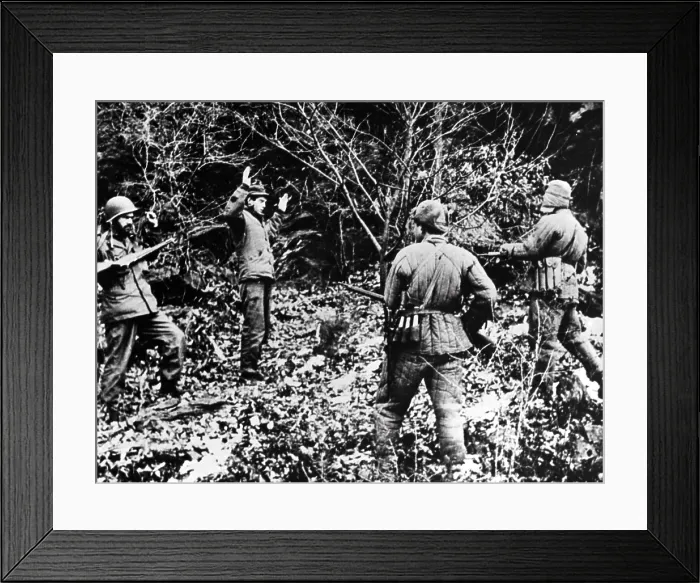 Framed Print : Two UN soldiers (probably U.S.) captured by North Korean soldiers. Probably in South Korea, ca. July-Oct. 1950