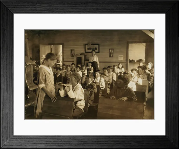 Framed Print : 1912 hygiene education in an Oklahoma school. One of the older students performs as daily inspection of teeth and finger nails for under the direction of the teacher