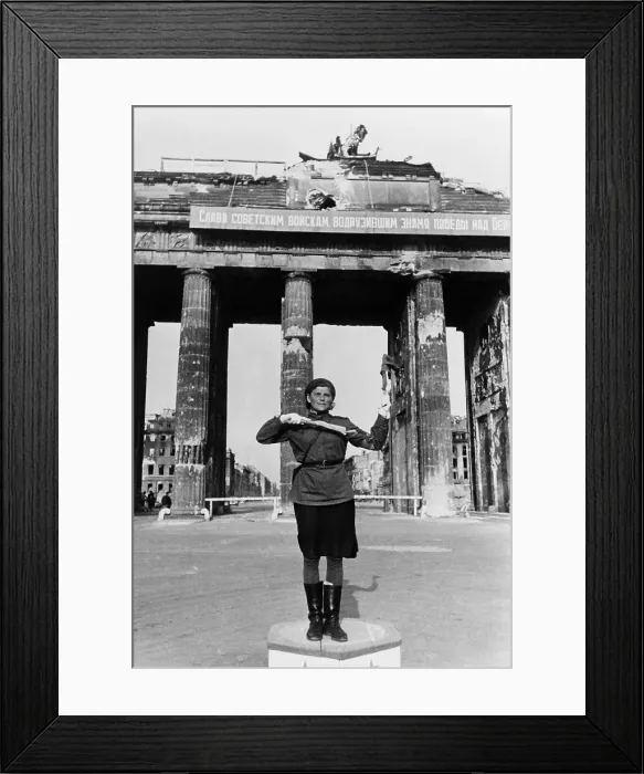 Framed Print : Soviet military police woman directing traffic at the Brandenburg Gate, in the Soviet Sector of divided Berlin, after the Nazi's surrendered in 1945 Framed Print : Soviet military police woman directing traffic at the Brandenburg Gate, in the Soviet Sector of divided Berlin, after the Nazi's surrendered in 1945