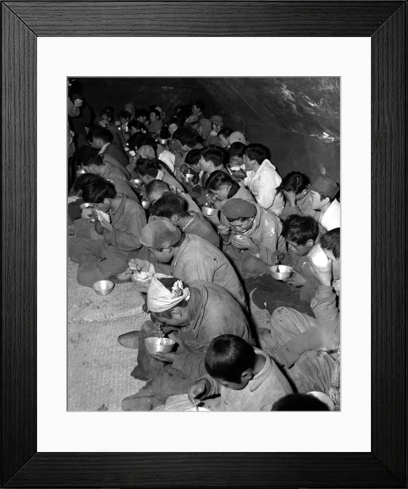 Framed Print : Communist soldiers are fed in the POW stockade, Kurije, Korea. They were captured and brought down from Mt. Chirisan, by soldiers of the ROK (Republic of Korea) Capitol Division