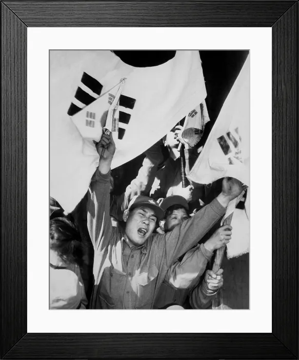 Framed Print : Joyous former POW who refused repatriation to North Korea. He celebrates with fellow ex-prisoners of war. He was released through the U.N Framed Print : Joyous former POW who refused repatriation to North Korea. He celebrates with fellow ex-prisoners of war. He was released through the U.N
