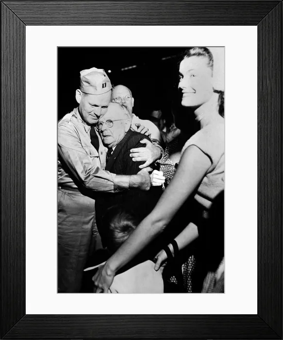 Framed Print : Repatriated POW Capt. Frederick Smith is greeted by his father on Sept. 14, 1953. Sept. 14, 1953. Fort Mason, California. Korean War, 1950-53. (BSLOC_2014_11_182)