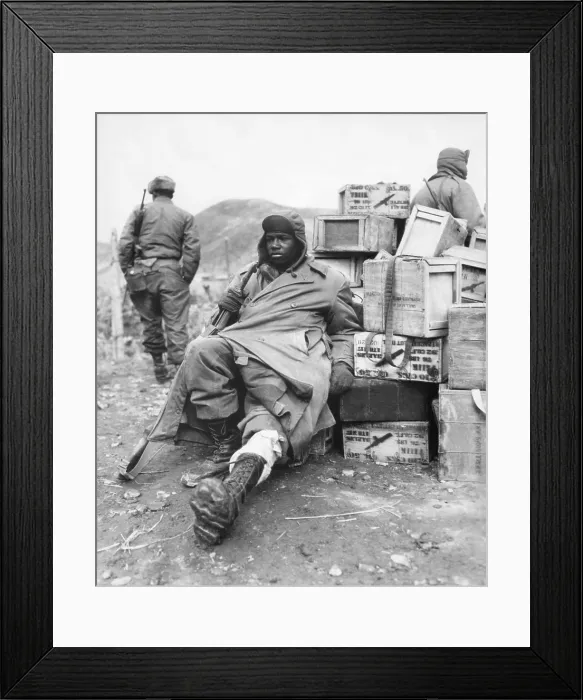 Framed Print : U.S. soldier of the 24th Infantry Regiment wounded in the leg on Feb. 16, 1951