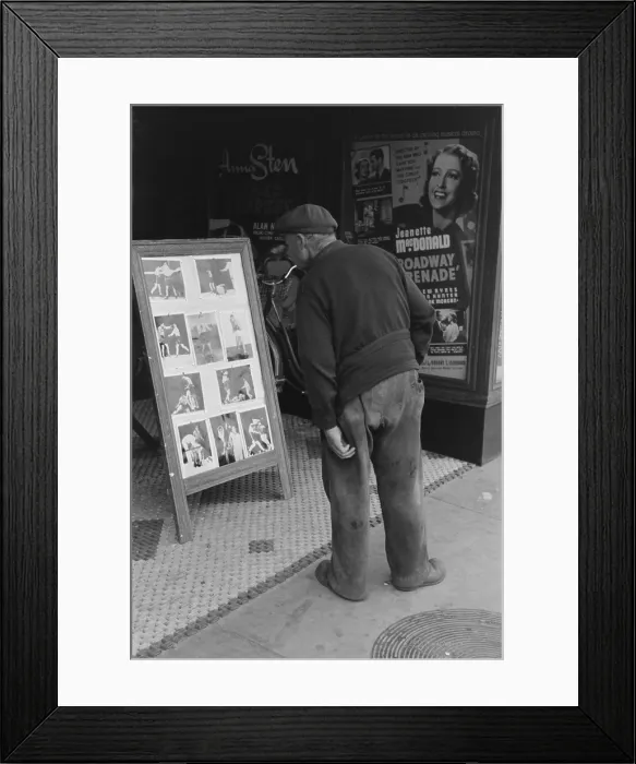 Framed Print : Elderly man with patches clothing looking at stills of Joe Lewis fight. Windsor Locks Connecticut. Oct. 1939 Framed Print : Elderly man with patches clothing looking at stills of Joe Lewis fight. Windsor Locks Connecticut. Oct. 1939