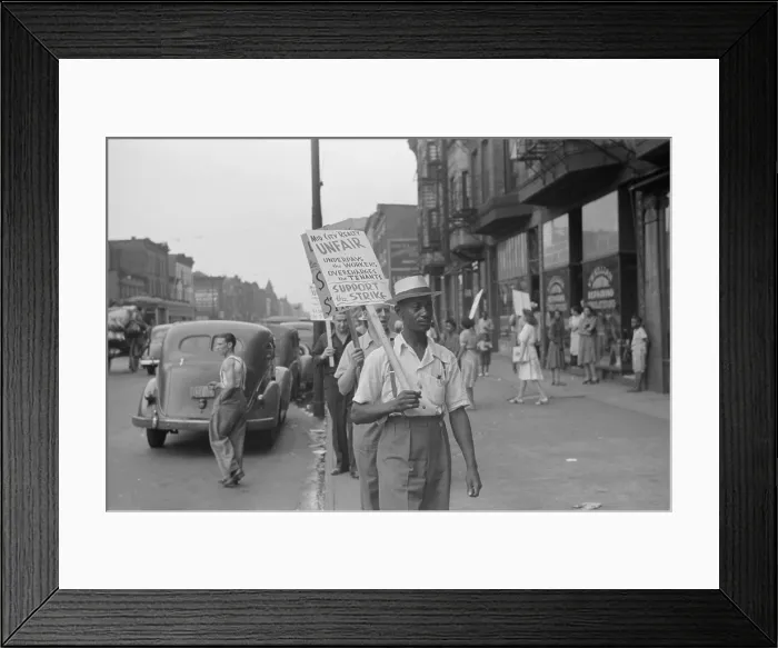 Framed Print : Striking workers picketing a reality company. Sign reads Mid City Reality Unfair-Underpays the Workers-Overcharges the Tenants-Support the Strike'. New York City ca