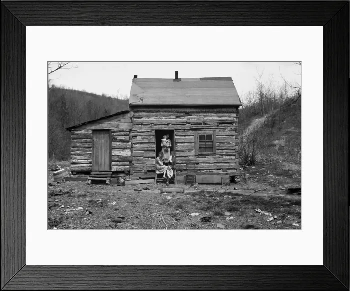 Framed Print : Log Cabin home in Ohio. A mother with four of her five children would be soon be resettled on Ross-Hocking Land Project near Chillicothe Ohio. April 1936