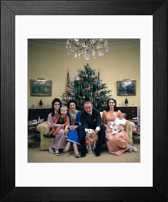Framed Print : President Johnson's family celebrating Christmas Eve. L-R: Luci Johnson Nugent, Lyn Nugent, Lady Bird Johnson, President Johnson, Lynda Johnson Robb, and baby Lucinda Robb Framed Print : President Johnson's family celebrating Christmas Eve. L-R: Luci Johnson Nugent, Lyn Nugent, Lady Bird Johnson, President Johnson, Lynda Johnson Robb, and baby Lucinda Robb