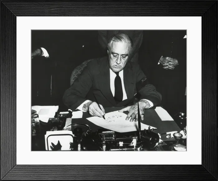 Framed Print : President Franklin Roosevelt signing the declaration of war against Japan. He wears a black armband in mourning for his recently deceased mother. Dec. 8, 1941. (BSLOC_2013_11_153)