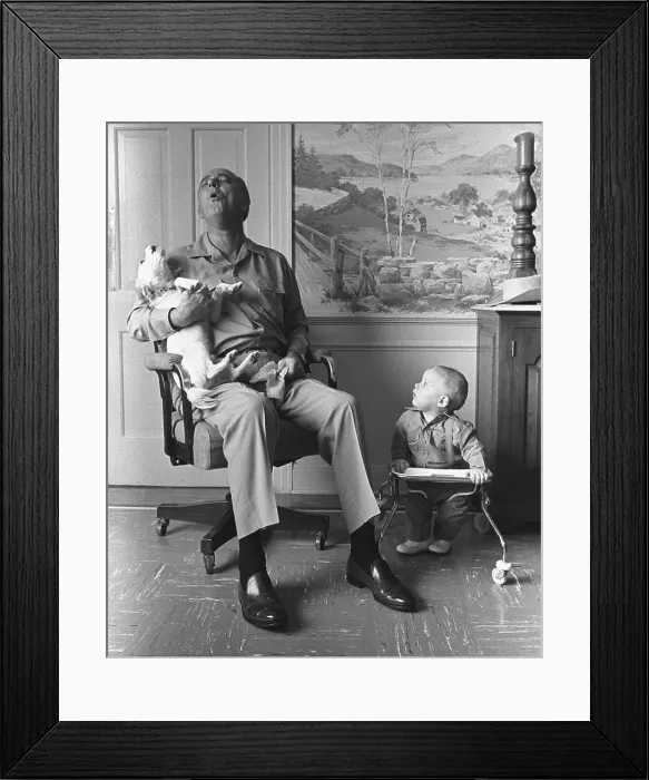 Framed Print : President Lyndon Johnson sings with dog Yuki while his grandson, Patrick Lyndon Nugent, looks on. LBJ Ranch, Jan. 6. 1968