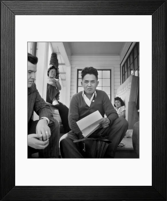 Framed Print : Young Japanese American celery grower holds documents to will lease his farm. He will interned or enlist in the Armed Forces until the end of World War 2