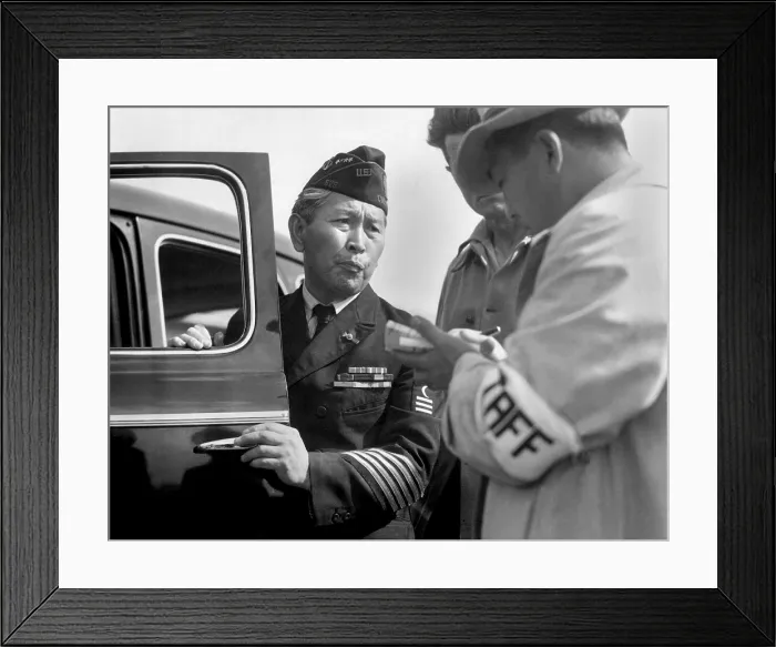 Framed Print : Japanese-American veteran, dressed in his WW2 uniform, reports for his World War 2 internment. Santa Anita Park assembly, Arcadia, California, April 5, 1942
