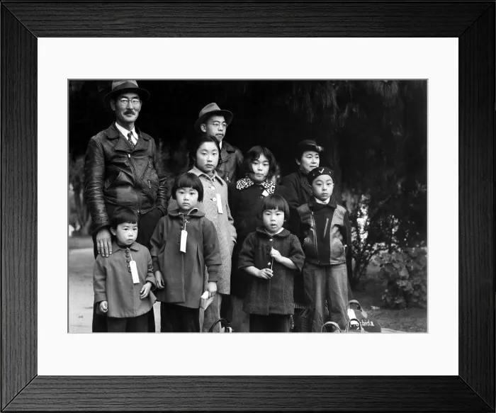Framed Print : Japanese-American Mochida family wear identification tags while awaiting evacuation bus. They will be sent to a remote internment camp for the duration of World War 2 Framed Print : Japanese-American Mochida family wear identification tags while awaiting evacuation bus. They will be sent to a remote internment camp for the duration of World War 2