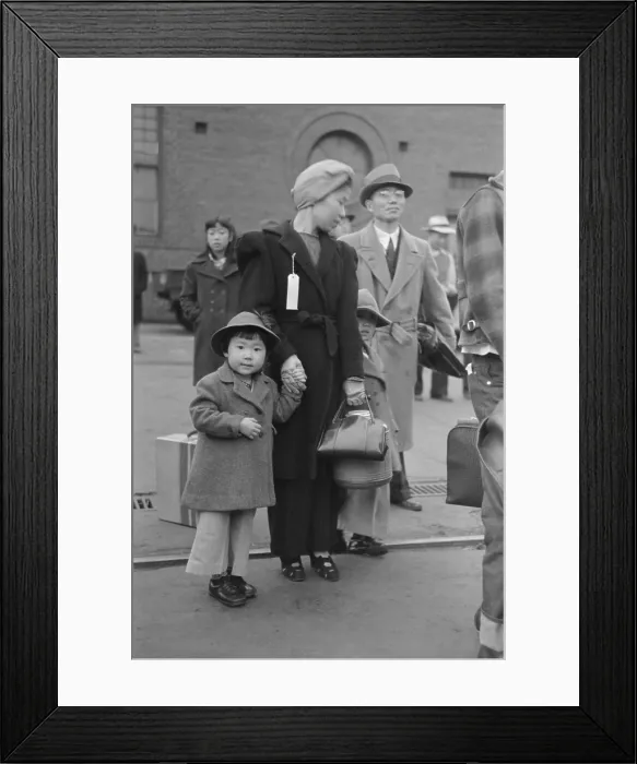 Framed Print : Japanese-American family waiting for train to take them to Manzanar internment camp. World War 2, April 1942 photo by Russell Lee. (BSLOC_2013_11_165) Framed Print : Japanese-American family waiting for train to take them to Manzanar internment camp. World War 2, April 1942 photo by Russell Lee. (BSLOC_2013_11_165)