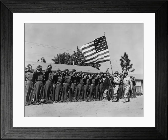 Framed Print : Japanese-American soldiers salute their country's flag on their arrival at Camp Shelby