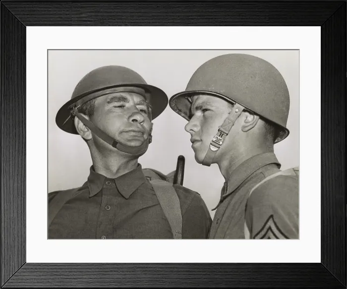 Framed Print : Soldiers in the old and new Army helmets at Fort Benning, Georgia, April 25, 1941