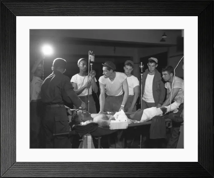 Framed Print : Seriously wounded soldier prepped for surgery at the 121st Evacuation Hospital, in Yongdong-pukn. August 17, 1951. Korean War, 1950-53. (BSLOC_2014_11_199) Framed Print : Seriously wounded soldier prepped for surgery at the 121st Evacuation Hospital, in Yongdong-pukn. August 17, 1951. Korean War, 1950-53. (BSLOC_2014_11_199)