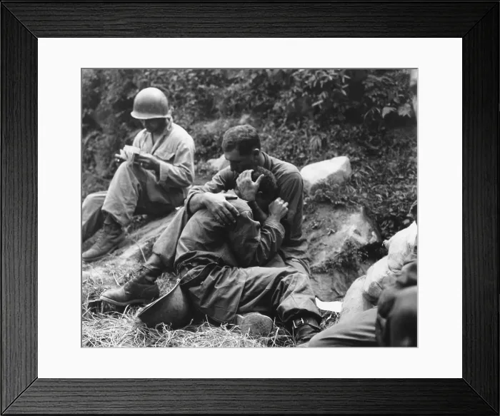 Framed Print : A grief stricken American infantryman whose buddy has been killed in action is comforted by another soldier Framed Print : A grief stricken American infantryman whose buddy has been killed in action is comforted by another soldier
