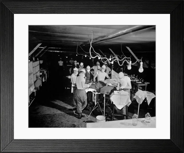 Framed Print : Surgery is performed on a wounded soldier at the 8209th Mobile Army Surgical Hospital. The MASH unit is twenty miles from the front lines. August 4, 1952. Korean War, 1950-53 Framed Print : Surgery is performed on a wounded soldier at the 8209th Mobile Army Surgical Hospital. The MASH unit is twenty miles from the front lines. August 4, 1952. Korean War, 1950-53
