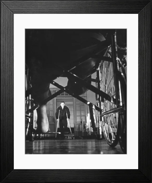 Framed Print : Korean War amputees use wheelchairs and crutches until they learn to walk with a synthetic limb. Walter Reed Military Hospital, Washington, DC. Dec. 8, 1950. (BSLOC_2014_11_204)