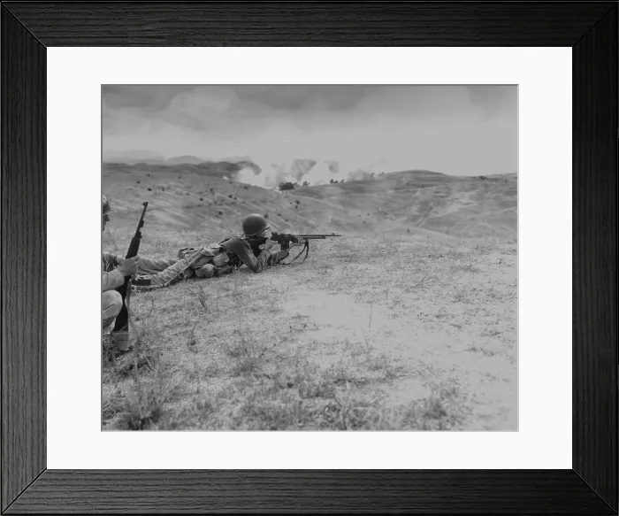 Framed Print : A turkey shoot ended the First Battle of the Naktong River. U.S. Marine fires an automatic rifle on North Koreans retreating across rice paddies in Naktong River Valley
