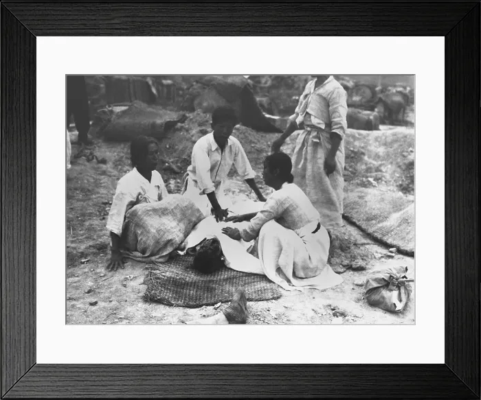 Framed Print : A Korean family mourns their murdered father, killed in mass executions at Chonju by North Koreans Framed Print : A Korean family mourns their murdered father, killed in mass executions at Chonju by North Koreans