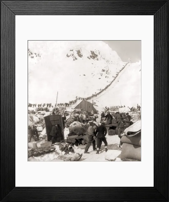 Framed Print : Long ribbon of miners bound for the Klondike gold fields climbing over the Chilcoot Pass, in 1898