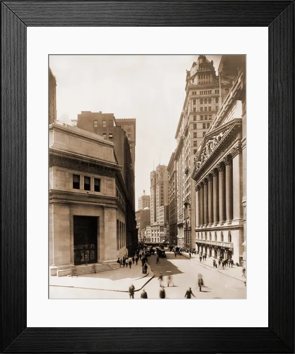 Framed Print : View down Broad street from its intersection with Wall Street. In right foreground is New York Stock Exchange, at left is the Morgan Bank Framed Print : View down Broad street from its intersection with Wall Street. In right foreground is New York Stock Exchange, at left is the Morgan Bank