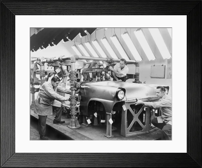 Framed Print : Engineers assembling a proto-type of the a Ford Motor Company auto. Auto makers met increased competition by offering bigger, more elaborate car designs yearly. 1954 Framed Print : Engineers assembling a proto-type of the a Ford Motor Company auto. Auto makers met increased competition by offering bigger, more elaborate car designs yearly. 1954