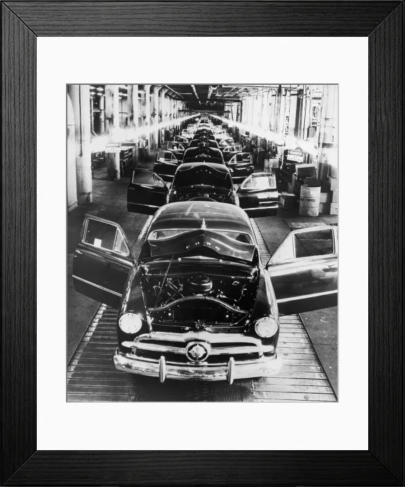 Framed Print : 1949 Ford cars sit on a deserted assembly line during the 25 day strike called by the United Auto Workers to oppose Henry Ford II's imposition of automation Framed Print : 1949 Ford cars sit on a deserted assembly line during the 25 day strike called by the United Auto Workers to oppose Henry Ford II's imposition of automation
