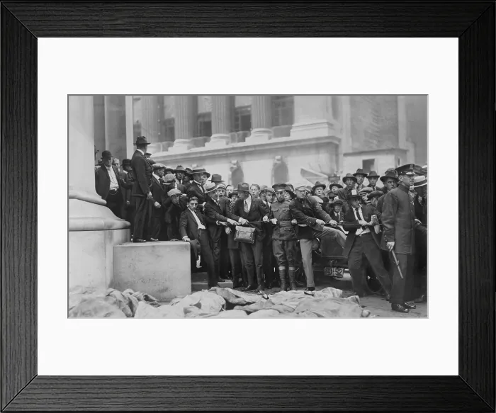 Framed Print : The Wall Street Bombing. Soldiers and police form a line at door of the Morgan Bank while bodies of the victims, covered with debris, are lying in the foreground