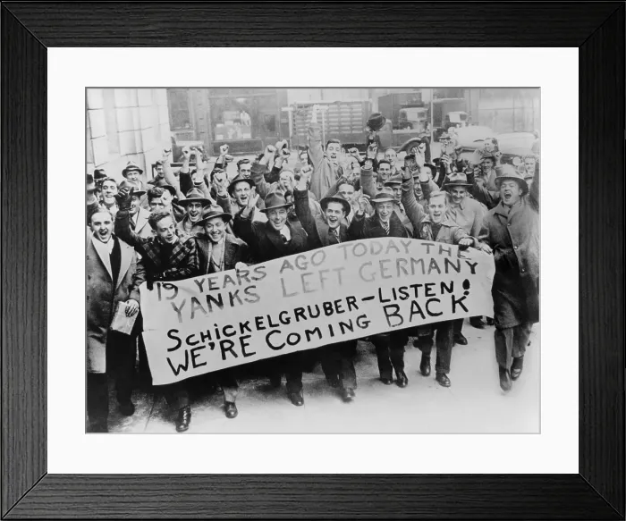 Framed Print : Cheering American men ready to go to war. They carry a sign reading 19 years ago today the Yanks left Germany. Schickgruber-Listen-We're Coming Back'. 1942 Framed Print : Cheering American men ready to go to war. They carry a sign reading 19 years ago today the Yanks left Germany. Schickgruber-Listen-We're Coming Back'. 1942