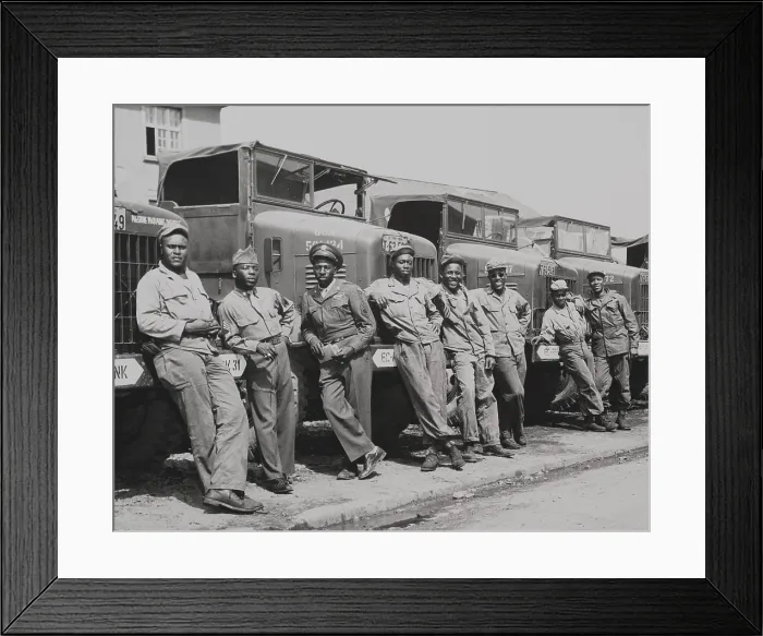 Framed Print : African American officers and mechanics standing in front of Army trucks