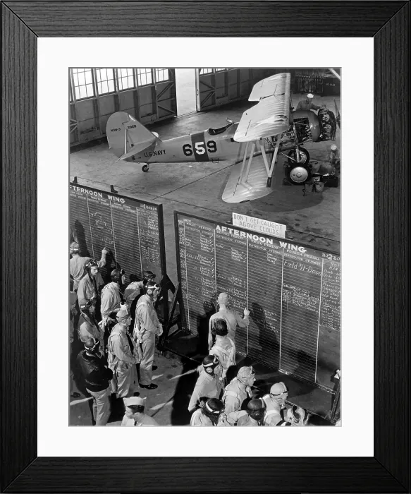 Framed Print : Aviation cadets check flight boards for last minute instructions at Corpus Christi, Texas. World War 2, Nov. 1942. (BSLOC_2013_11_191)