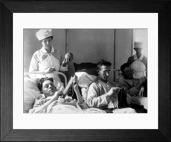 Framed Print : Wounded American Veterans of World War I. Nurses are assisting bed-ridden wounded in knitting. Walter Reed Hospital, Washington, D.C. Ca. 1918-19 Framed Print : Wounded American Veterans of World War I. Nurses are assisting bed-ridden wounded in knitting. Walter Reed Hospital, Washington, D.C. Ca. 1918-19