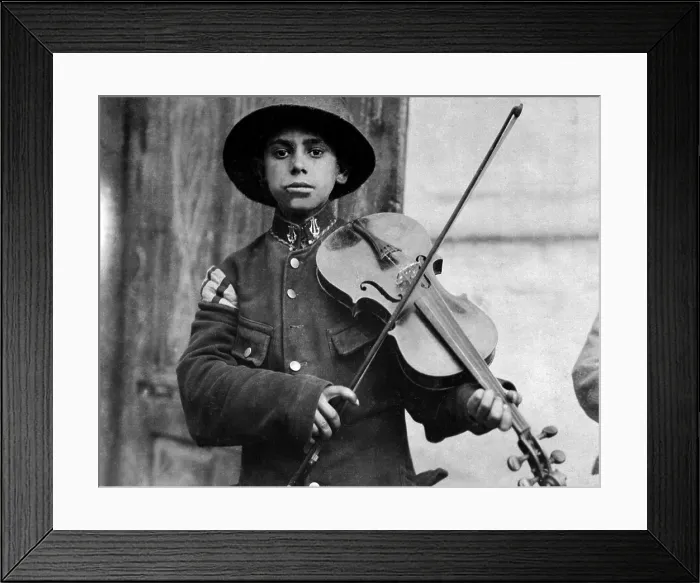 Framed Print : A young Christmas street fiddler, Belgrade, Serbia. Photo by Lewis Hine. Dec. 1918 Framed Print : A young Christmas street fiddler, Belgrade, Serbia. Photo by Lewis Hine. Dec. 1918