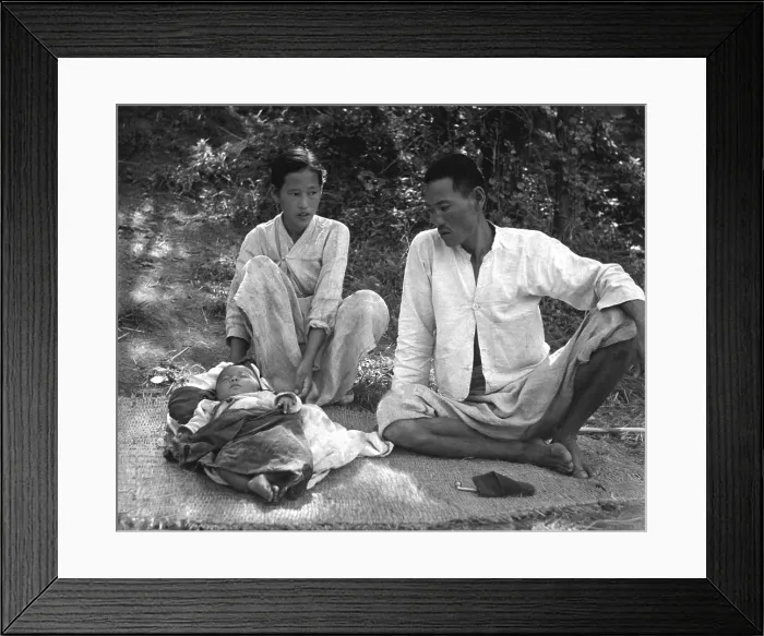 Framed Print : A young refugee family living in a refugee camp at Changseung-po, Korea. October, 1950. Korean War, 1950-53. (BSLOC_2014_11_241)