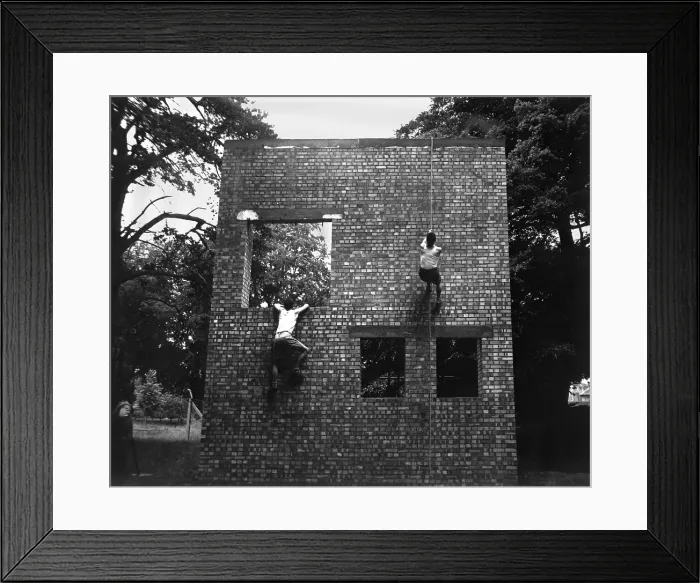 Framed Print : Two Jeds scale brick wall in training exercises at Milton hall, England, ca. 1944