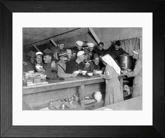 Framed Print : An unusual World War I scene of an African American soldier being served with American and French service men. American Red Cross canteen lunch bar at Bordeaux, France. Oct. 1918