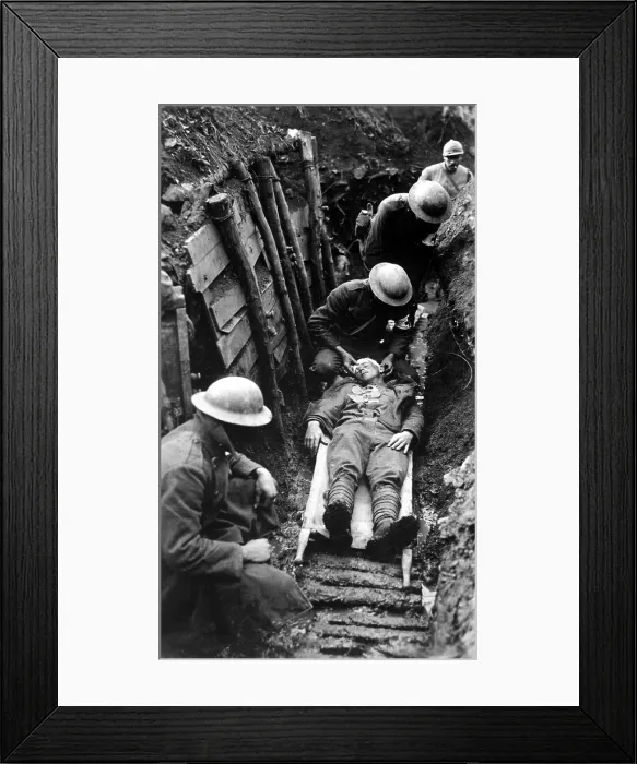 Framed Print : U.S. Marine receiving first aid in the trenches before being sent to hospital in rear. World War I, Toulon Sector, France. March 22, 1918