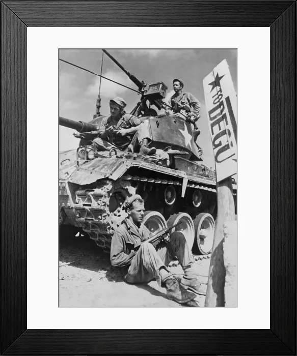 Framed Print : U.S. soldiers guard a roadblock on the Naktong River front in the Taegu area with an M-24 tank. Aug.-Sept. 1950