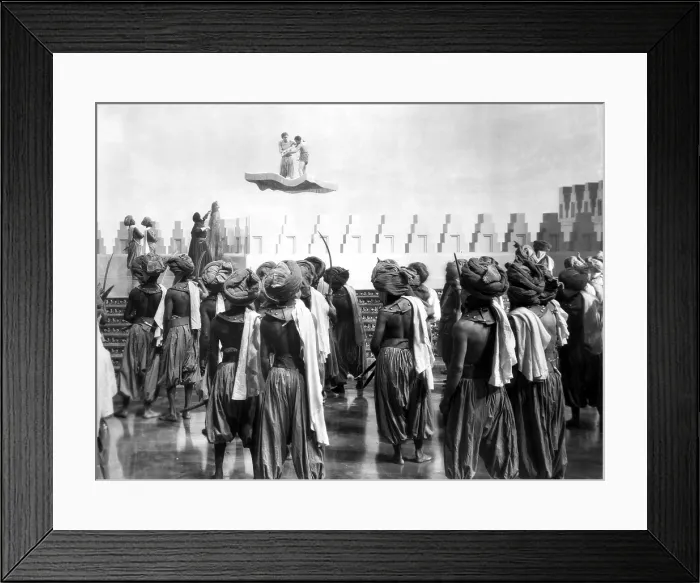 Framed Print : THE THIEF OF BAGDAD, Conrad Veidt (back left with arm raised), John Justin and Sabu on flying carpet, 1940