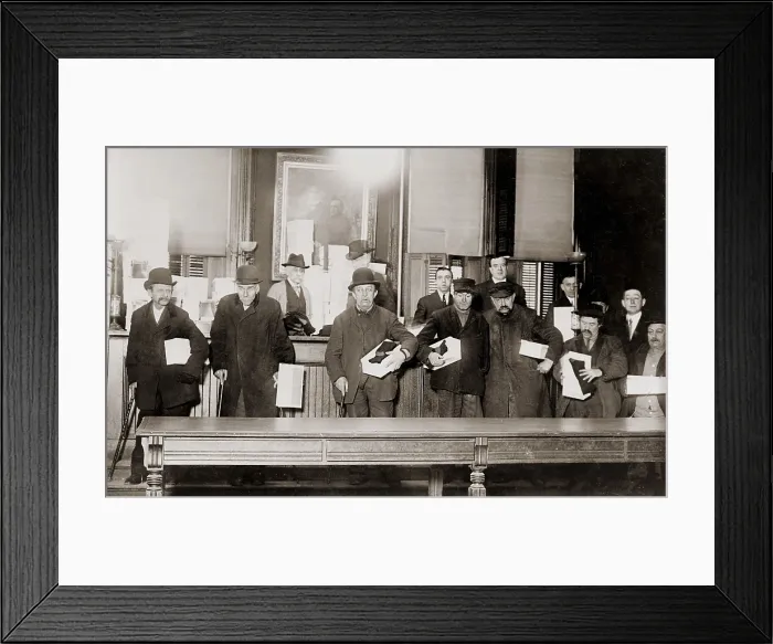 Framed Print : Impoverished Bowery men, pose for a group photo to document the generosity of local politician Tim Sullivan (1862 -1913), who gave them a gift of new shoes and socks. 1910