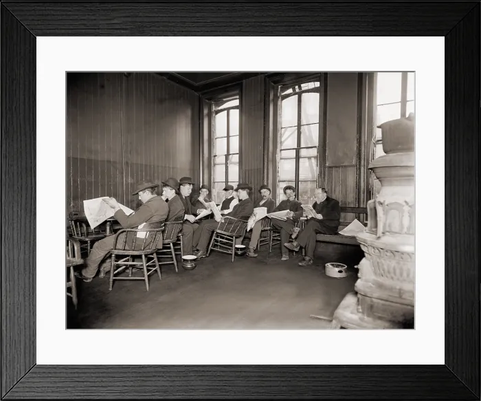 Framed Print : Homeless men in the reading room of a dime a night Bowery lodging house in 1910